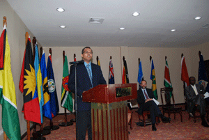 Minister of Culture, Youth and Sport Dr. Frank Anthony addressing the opening of COHSOD XXIII - Children and Youth. Sitting from left is CARICOM Secretary-General Ambassador Irwin LaRocque and UNICEF Representative Mr. Suleiman Braimoh