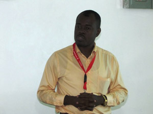 Director of Standards Dr. Julian Amsterdam making his presentation on the licensing of the Cancer Institute of Guyana. alt