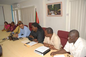 Minister Robert Persaud (at centre) addressing members of the local media on the death of four Brazilians at Arau backdam, Eteringbang. To his right is Acting Commissioner of the GGMC, Mr. Rickford Vieira, to his left is Permanent Secretary, Mr. Joslyn Mc Kenzie (Sonell Nelson photo)
