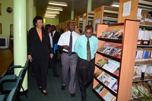 The Surinamese delegation being led through the parliament library yesterday