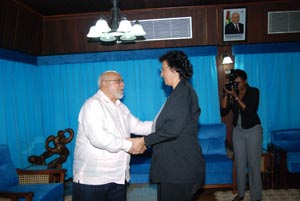 President Donald Ramotar greets Speaker of the National Assembly of Suriname, Dr. Jennifer Geerlings-Simons upon her arrival at Office of the President yesterday