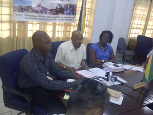 From left are Municipal Services Officer Mr. Fabian Jerrick; Minister within the Ministry of Local Government Norman Whittaker and Deputy Permanent Secretary Ms Abena Moore