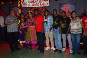 The PYO group receive their prize for showcasing the best float at the 2013 Diwali motorcade.