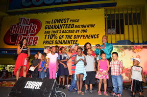 Acting President, Samuel Hinds on stage last night as he switched on the Christmas tree lights