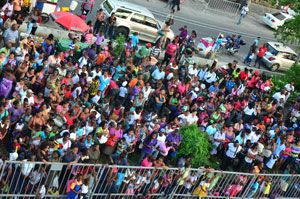 The large gathering at Courts Guyana Inc. Christmas trees light up