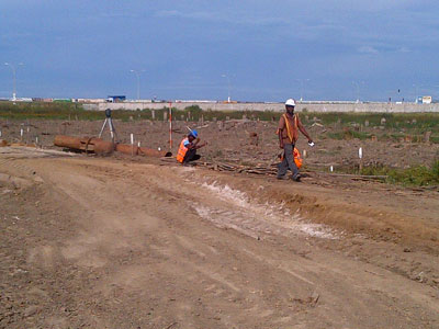 Workers of BK International are busily engaged in the pile-driving exercise (Photos by Leroy Smith)