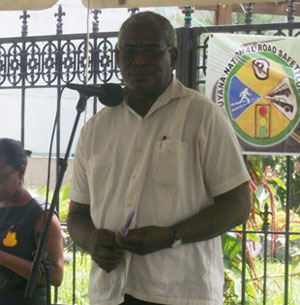 Minister of Public Works Robeson Benn speaking at the launch of Road Safety Month 2013.
