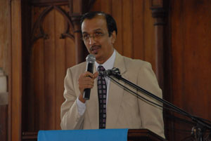 Terry Holder’s longtime friend, Brij Parasnath, paying a tribute at the funeral service