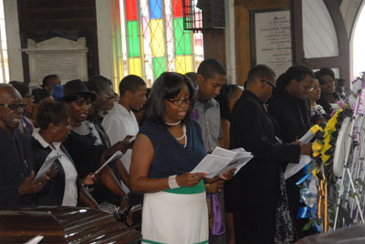 Bereaved family members at the Thanksgiving Service