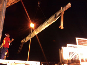 The damage transom being removed to be replaced by the new one