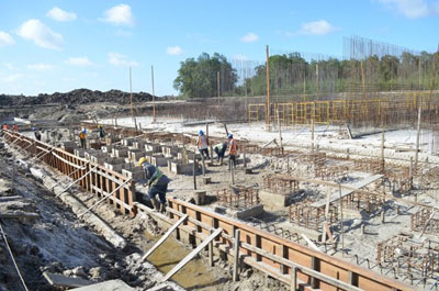 Construction work in progress at the eight-door, sea-side sluice for the Northern Relief Channel