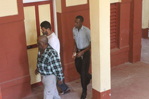 Defendant Winston Blades wearing green checked shirt