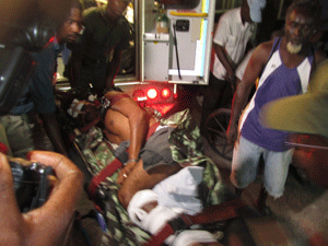 The more critically injured survivor being wheeled into the Accident and Emergency Unit of the Georgetown Public Hospital