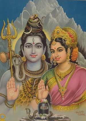 Mother Parvati and Lord Shiva, as creators of mankind, with the symbol of procreation – the lingam and Yoni -- in the foreground. They are also known as the Shivalingam