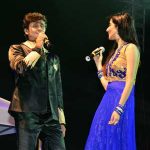 Sonu doing a duet with a member of his entourage