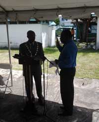 ‘ILLEGAL?’: PRO Royston King reciting the Oath of Office in the presence of Mayor Hamilton Green