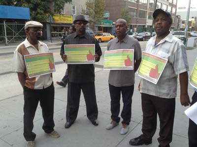 A small band of protestors outside the Woodbine Ballroom in Brooklyn, New York (Photos courtesy of Aubrey Odle)