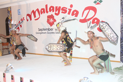 Staff of BCL performing a “warrior dance” as Malaysia Day was celebrated at the New Thriving Banquet Hall last Friday