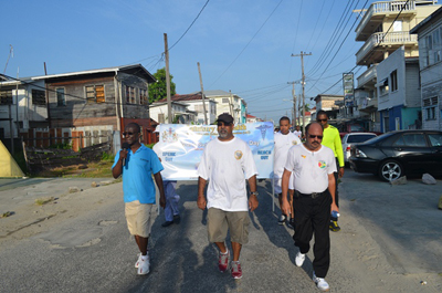 PAHO Representative, Dr. William Adu-Krow, IAC Executive Member, Neaz Subhan and Health Minister, Dr. Bheri Ramsaran leading the Suicide Prevention Walk