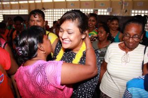  Minister of Education, Priya Manickchand warmly greeted by a Region 5 resident 
