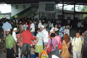 Not just the poor and needy, but persons from all walks of life converged yesterday at the CIOG headquarters on Woolford Avenue (Photo by Cullen Bess-Nelson)  