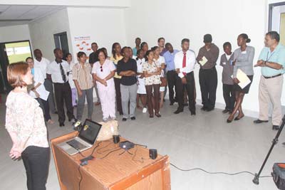 CEO, Mr. Michael Khan (at right) makes a point to participants
