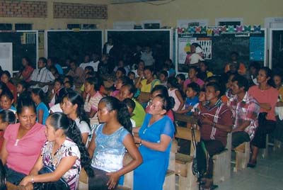 Ms. Liz (in blue dress) taught almost everyone in this photo
