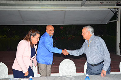 President Donald Ramotar congratulates Sir Shridath Ramphal on the launching of his book last evening, in the company of Foreign Affairs Minister, Carolyn Rodrigues-Birkett