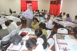 Dr. Ray Rist (standing) with participants  