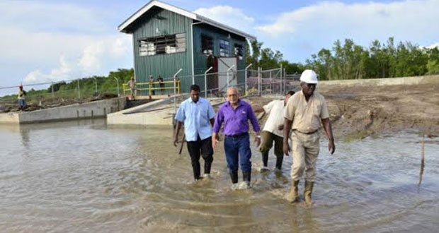 President Ramotar visits flood hit East Coast communities – checks drainage facilities