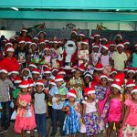 Mrs. Ramotar spreading the Christmas cheer at Mibikuri Primary