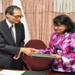 Caption: Roadside Baptist Church Skills Training Centre Chief Executive Officer Yetrawatee Katryan shakes hands with First Secretary of the Embassy of Japan Takaaki Kato on receiving the grant for the church