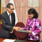  Roadside Baptist Church Skills Training Centre Chief Executive Officer Yetrawatee Katryan shakes hands with First Secretary of the Embassy of Japan Takaaki Kato on receiving the grant for the church 