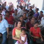 Residents of Huis’t Diren listen attentivly to President Ramotar at a community meeting