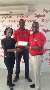  Javanka Williams and Mr. Cary Gillis receiving their sponsorship cheque from Gavin Hope 