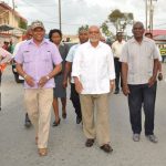 Chairman of BK International, Mr Brian Tiwarie, President Donald Ramotar, and Public Works Minister, Mr Robeson Benn during a walk around at Vreed-en-Hoop yesterday 