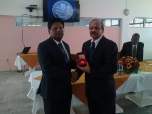 ‘A piece of Guyana’s history on display’:  Finance Minister Dr Ashni Singh and Central Bank Governor Dr Gobin Ganga showing the new $5,000 Coin  