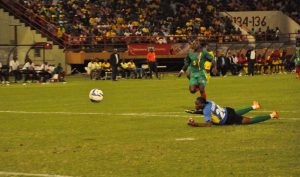 Beaten! Grenada’s goalkeeper could only watch as Pernell Schultz’s strike finds its way to the goal.