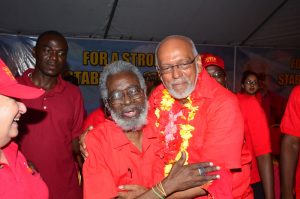 Comrades-of-old, Dr Roger Luncheon and President Donald Ramotar having a good time at yesterday’s rally at Stewartville, West Coast Demerara 