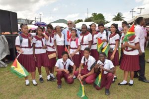 Secondary School students of Region Seven who have benefitted from government's $10,000 grant take a photo with President Donald Ramotar 