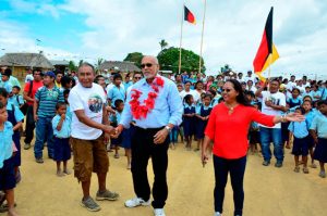 President Donald Ramotar and Amerindian Affairs Minister Pauline Sukhai being welcomed by residents of Kurukabaru, Region 8