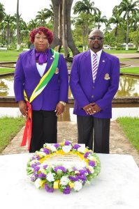 APGI President, Mr Errol Lewis, and its Organising Manager, Ms Bonita Montaque paying tribute to Guyana’s first president (Photos by Delano Williams)