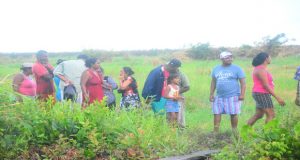 Residents in the backlands at ‘Grassfield,’ Mon Repos, East Coast Demerara, as they seek to acquire plots of land yesterday