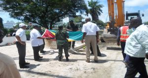 Colonel Laurie London putting systems in place for the clean-up and grand flag-raising ceremony on May 26th 