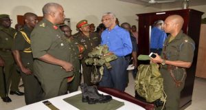 Chief of Staff of the Guyana Defence Force, Brigadier Mark Phillips and Major Eon Murray give Commander-in-Chief President David Granger a tour of the Colonel Ulric Pilgrim Officers’ Cadet School’s accommodation building at Camp Stephenson, Timehri.   