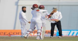 Veerasammy Permaul celebrates with Denesh Ramdin after he dismissed Moeen Ali on day two of the third Test. The left-arm spinner went on to take two more scalps on day three to finish with three for 43.