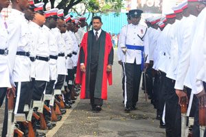 Justice Navindra Singh elegantly inspects the Guard of Honour. It was one of his duties to mark the opening of the session (Photo by Samuel Maughn)