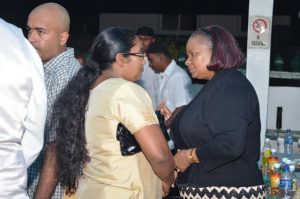 Minister Volda Lawrence speaking with a member of the Anna Catherina Islamic Complex