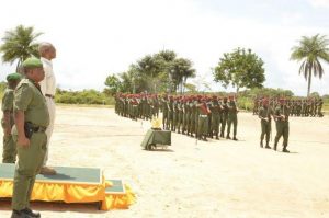 President David Granger and Chief of Staff of the Guyana Defence Force, Mark Phillips, taking the salute from the 270 privates who recently completed the Basic Recruit 2015/01 Course