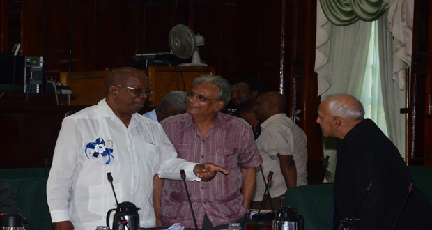 Finance Minister, Mr Winston Jordan [left) in amiable conversation with Education Minister, Dr Rupert Roopnaraine (centre), and Communities Minister, Mr Ronald Bulkan (Photo by Adrian Narine)